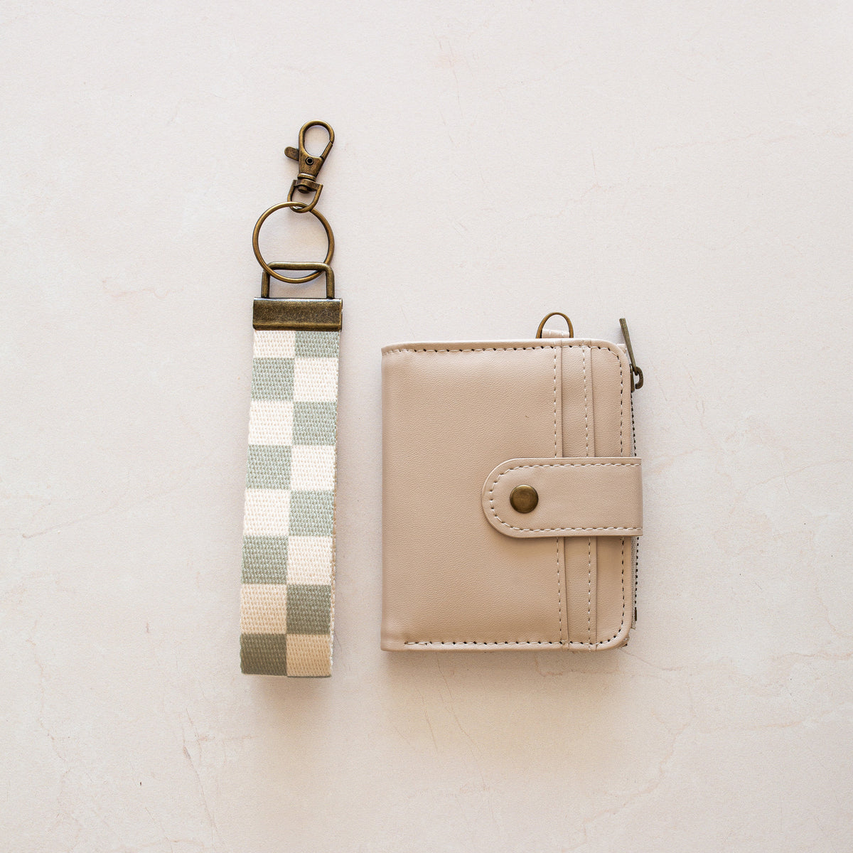 Beige bifold wallet with Green Checker wrist lanyard