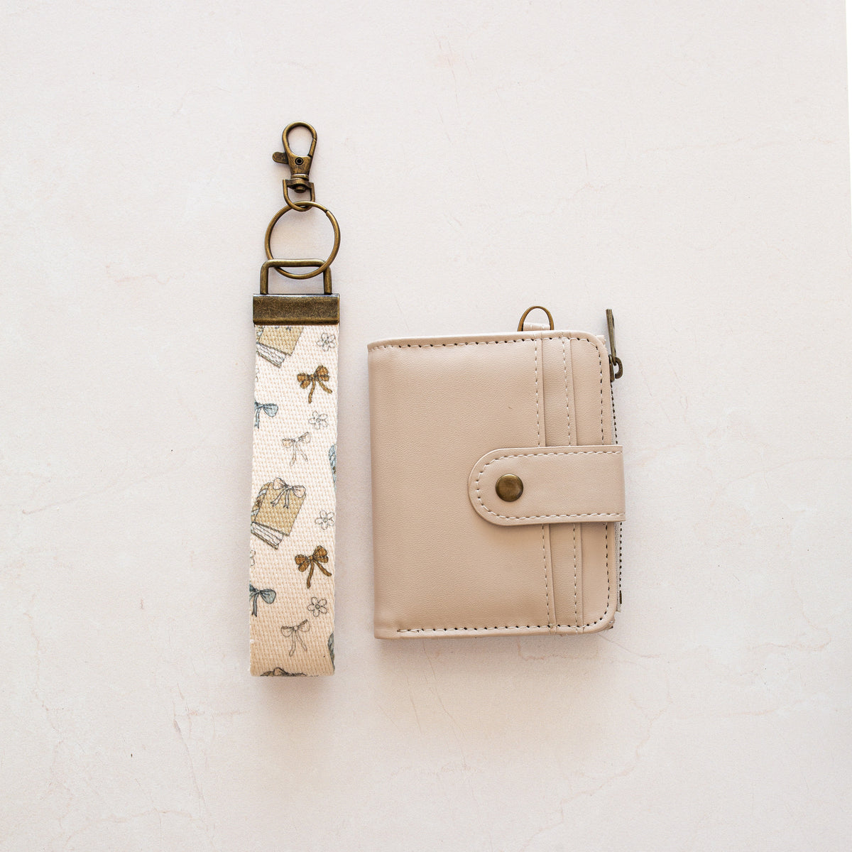 Beige bifold wallet with Books Bows wrist lanyard