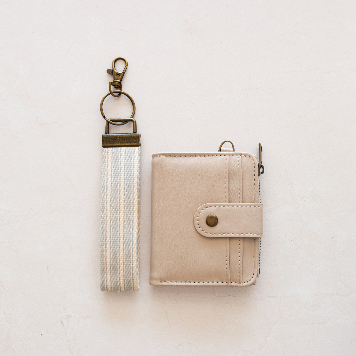 Beige bifold wallet with Blue Stripe wrist lanyard