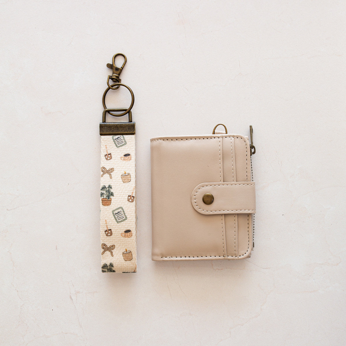 Beige bifold wallet with Cozy Girl wrist lanyard