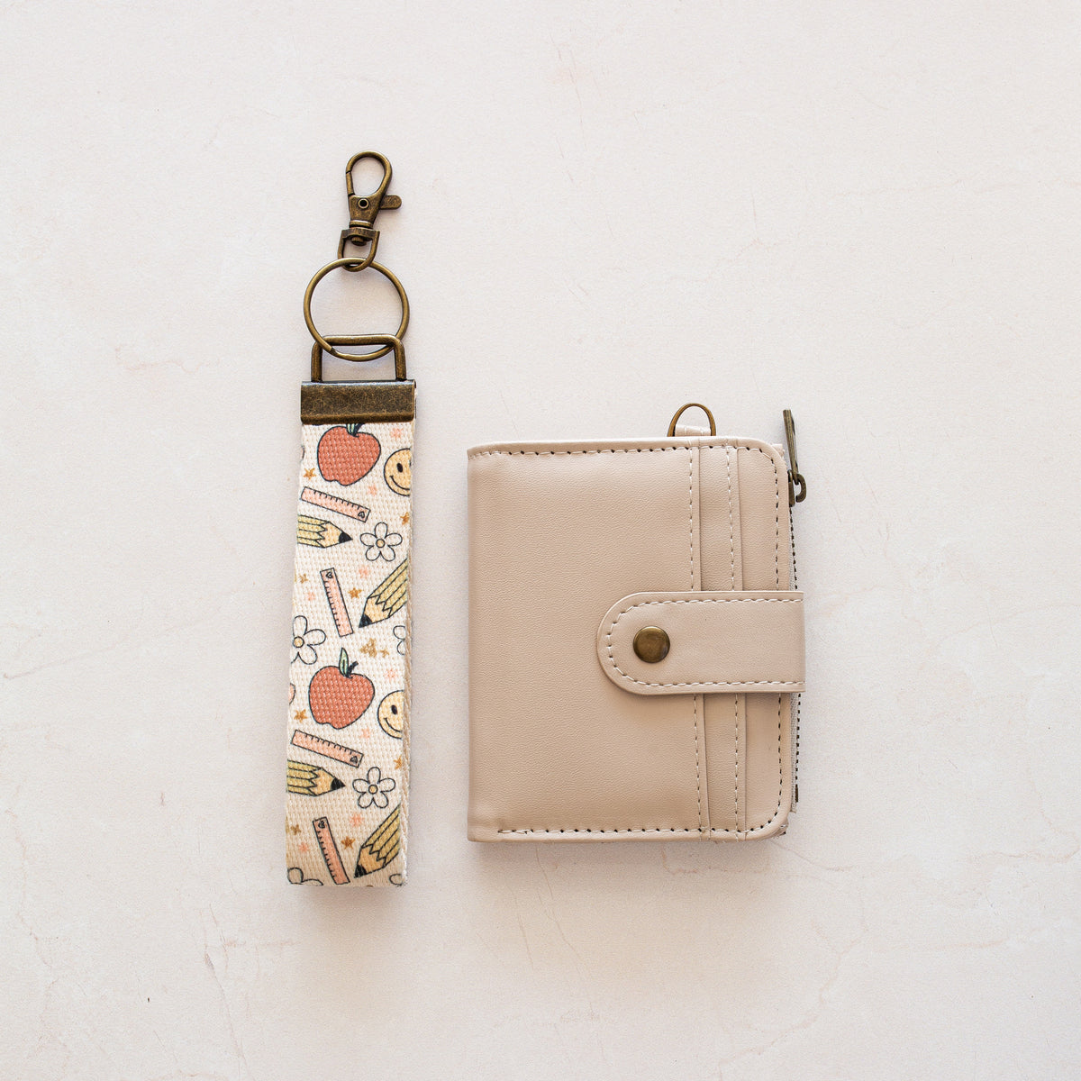 Beige bifold wallet with Teacher wrist lanyard