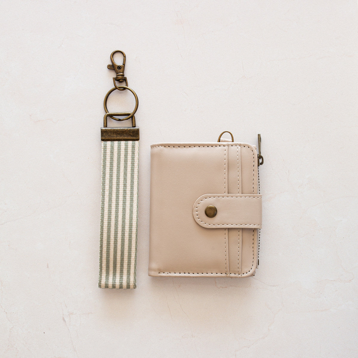 Beige bifold wallet with Green Stripe wrist lanyard