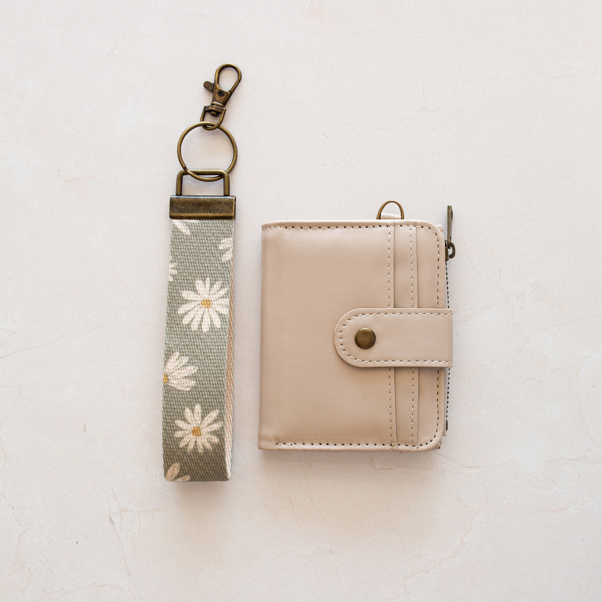 Beige bifold wallet with Sage Daisy wrist lanyard