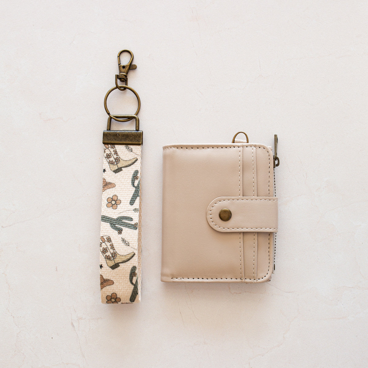 Beige bifold wallet with Cactus Cowgirl wrist lanyard